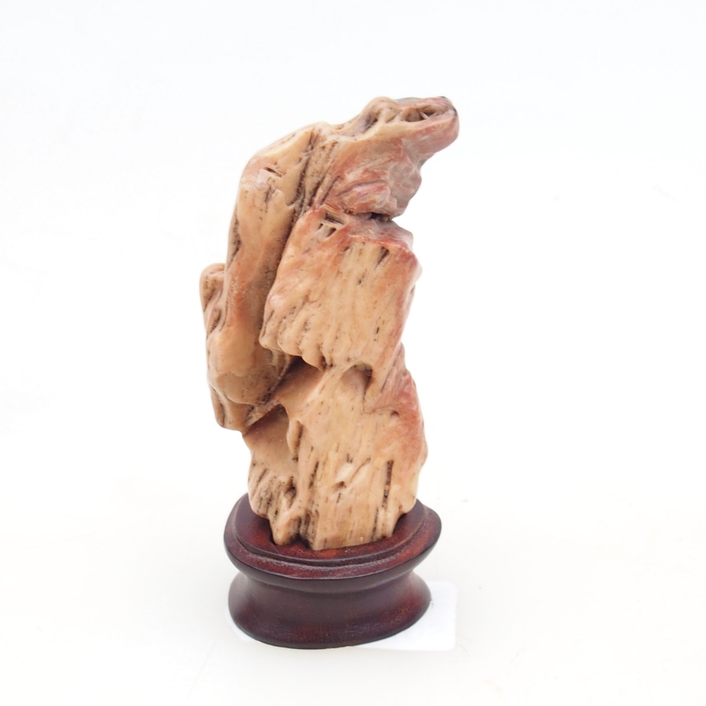 Suiseki - Stone with DAI (wooden pad)