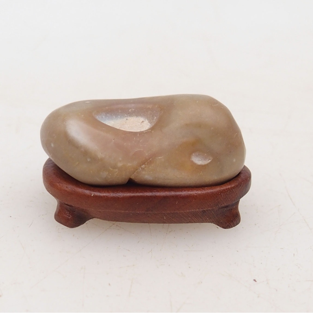 Suiseki - Stone with DAI (wooden pad)