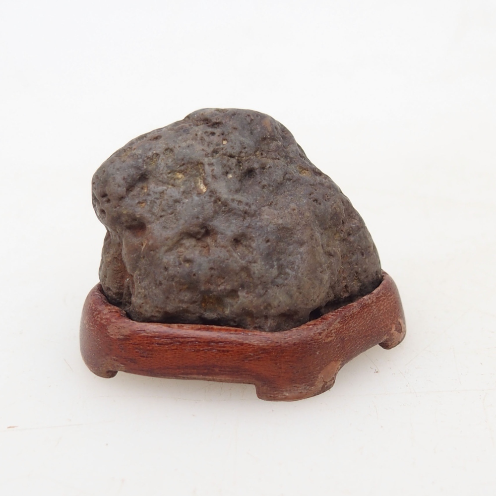 Suiseki - Stone with DAI (wooden pad)