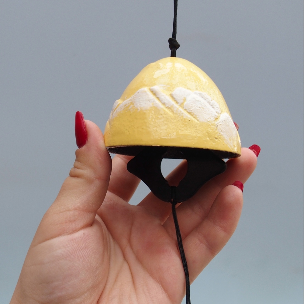 Metal wind chime, yellow