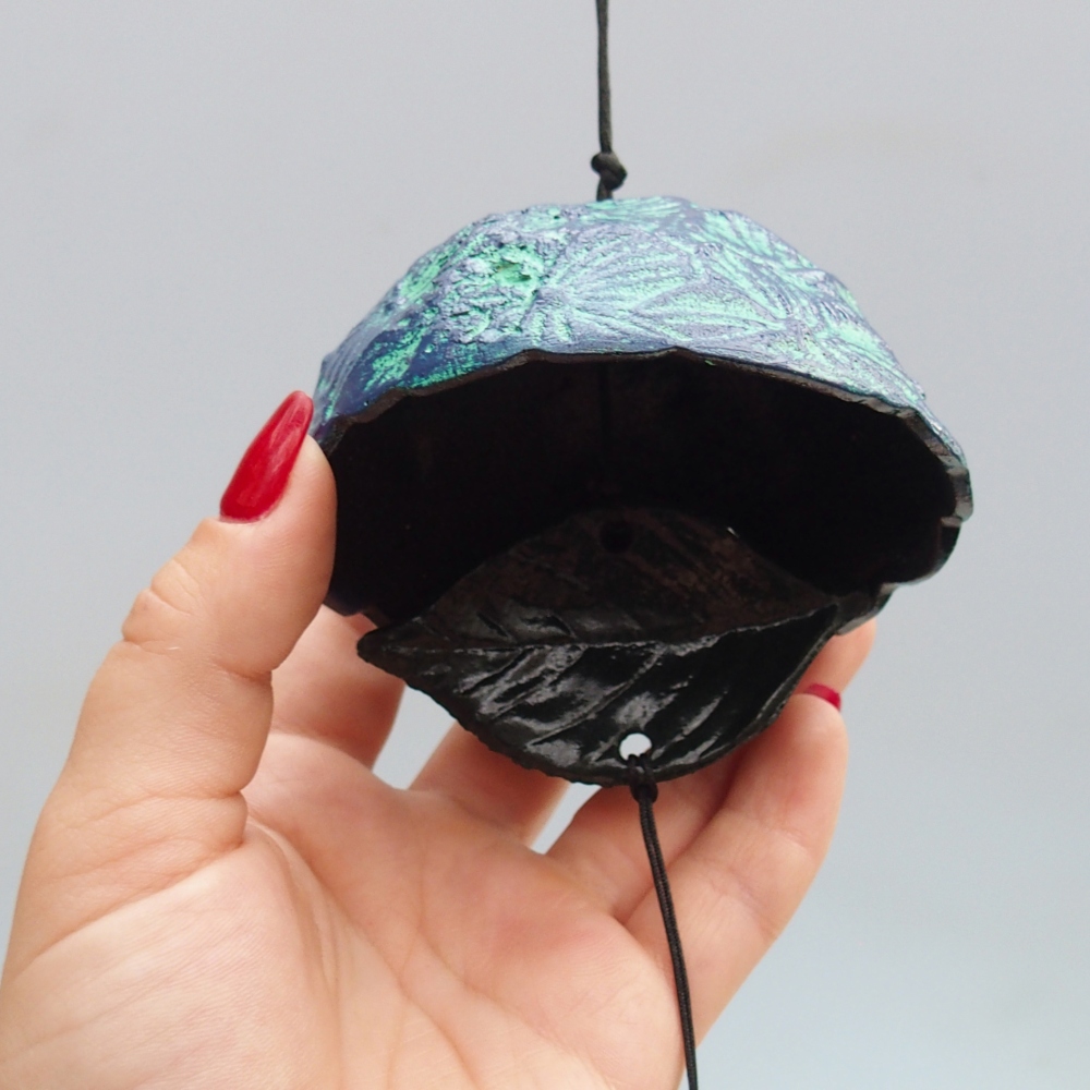 Metal wind chime, blue-green