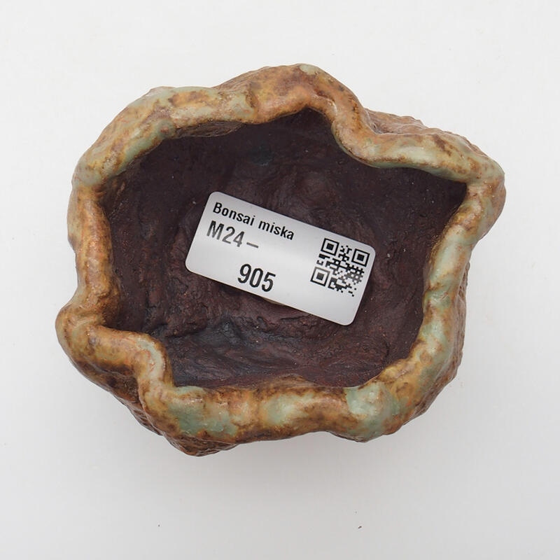 Ceramic shell 6 x 5 x 5.5 cm, green-brown color
