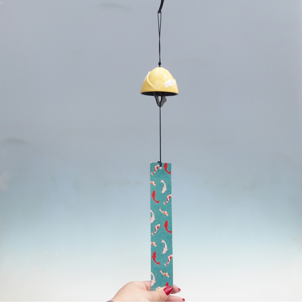 Metal wind chime, yellow