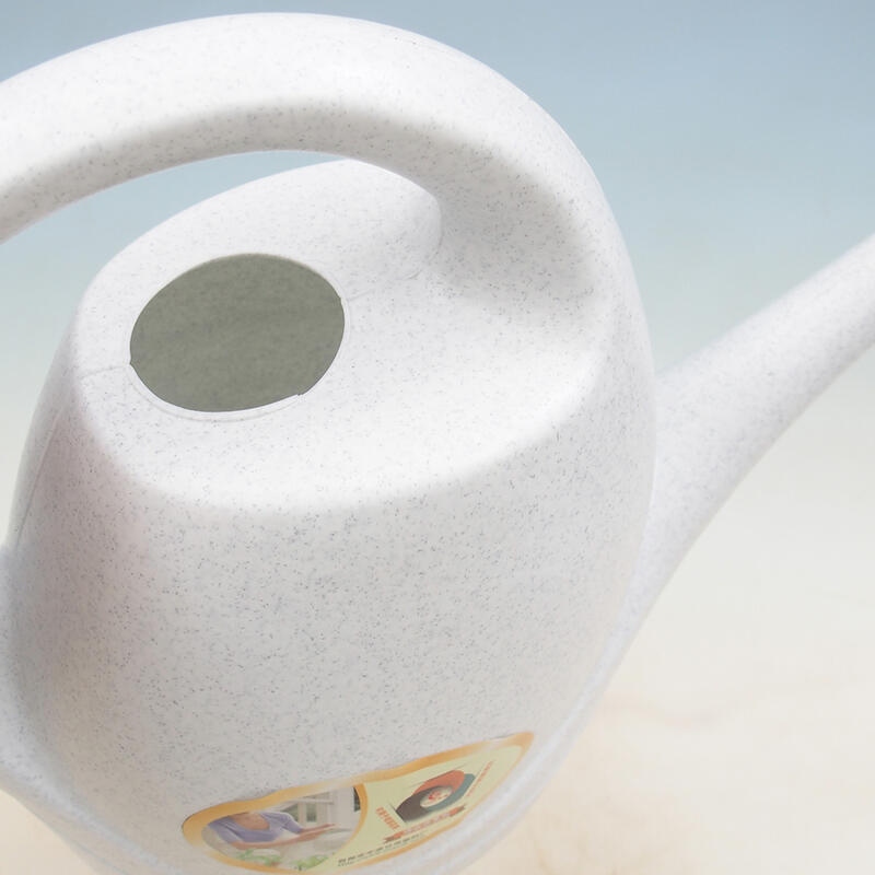 Plastic watering can 3 liters white
