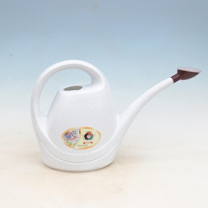 Plastic watering can 3 liters white