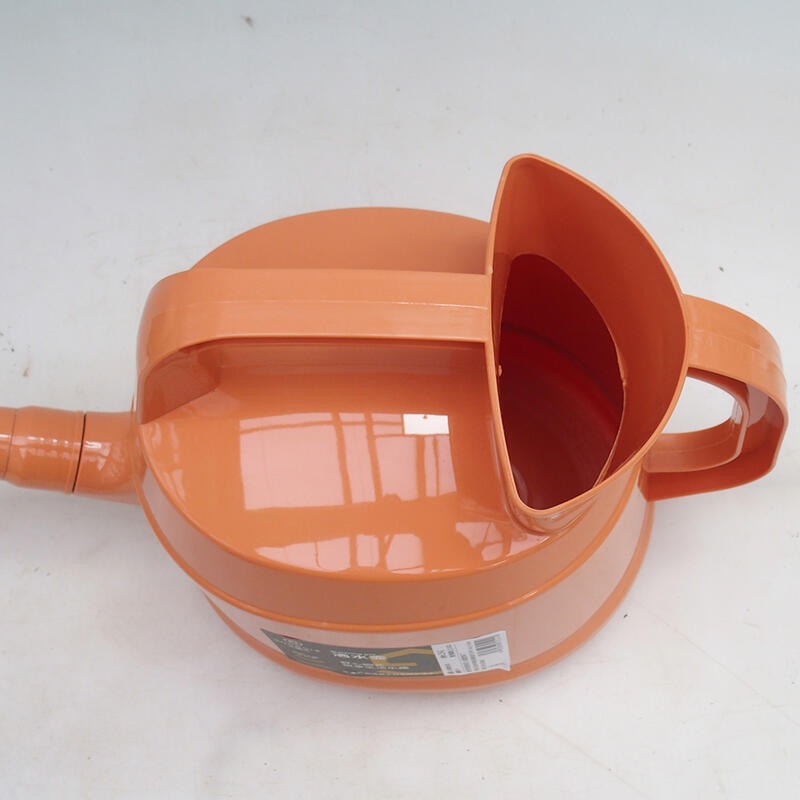 Plastic watering can 4.5 liters Orange