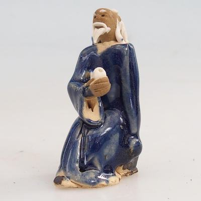 Ceramic figurine - a sage with a pipe - 1