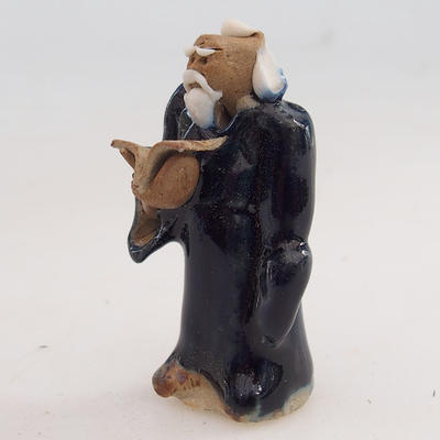 Ceramic figurine - a sage with a book - 1