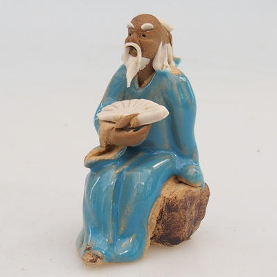 Ceramic figurine - a sage with a fan - 1