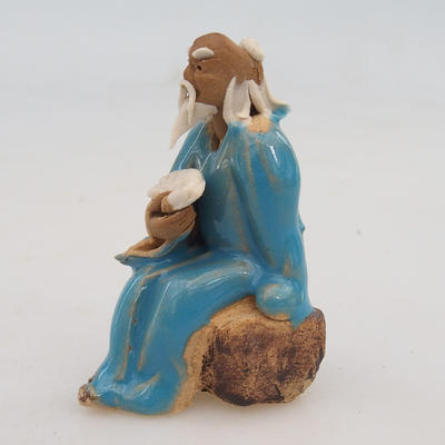 Ceramic figurine - a sage with a fan - 2