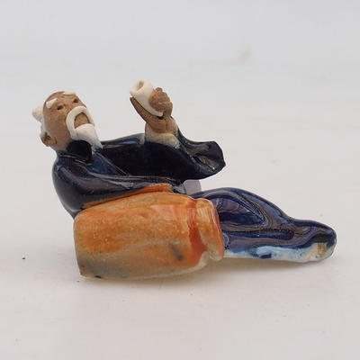 Ceramic figurine - lying sage - 2